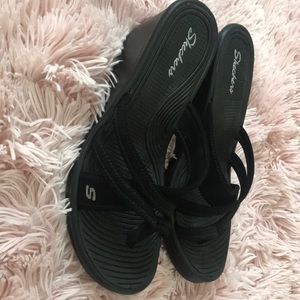 Skechers wedge sandals.